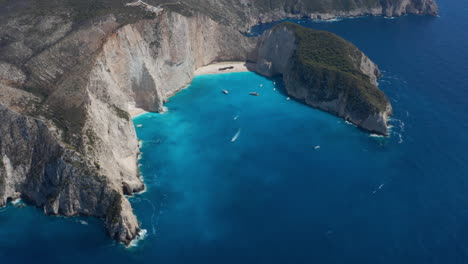 Stunning-View-From-Above-Of-The-Famous-Navagio-Beach-With-Shipwreck-Remains-In-Zakynthos,-Greece