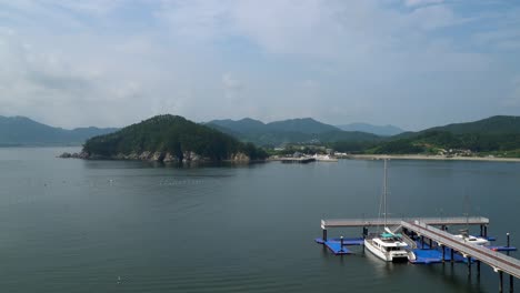 Beautiful-Green-Hills-And-Calm-Sea-In-Geonje-City-South-Korea---wide-shot