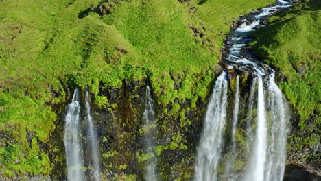 The-Cascades-From-Steep-Rocky-Mountains-At-Seljalandsfoss,-South-Coast-Of-Iceland