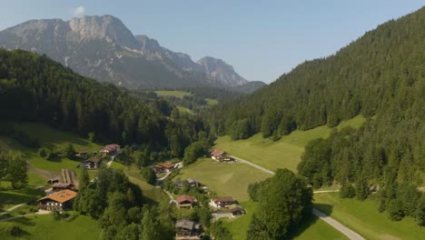 Aerial-View-of-Rural-Village-in-Bavaria-on-Picturesque-Summer-Day,-Alps-in-Background