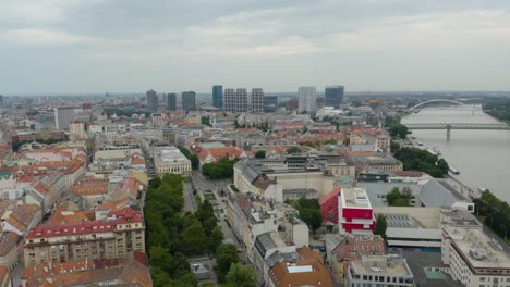 Aerial-Establishing-Shot-of-Downtown-Bratislava,-Slovakia-on-Cloudy-Day