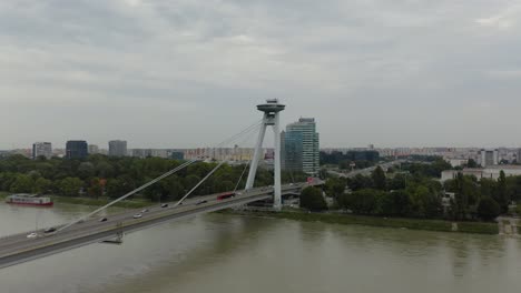 Aerial-Drone-Shot-of-Bridge,-UFO-Lookout-Tower,-Restaurant-in-Bratislava,-Slovakia
