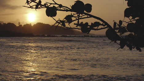 Idyllic-Golden-Sunrise-View-from-Tropical-Beach-of-Puerto-Plata-Coastline-Ocean-Waves,-Dominican-Republic