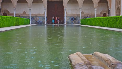 Rainy-day-at-the-pool-of-Courtyard-of-the-Myrtles-in-Alhambra,-Granada,-Spain