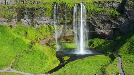 Aerial-View-Of-Seljalandsfoss-Waterfall-On-A-Sunny-Day-In-South-Iceland
