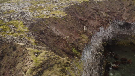 Volcanic-Rock-Cliffs-on-Coastline-of-West-Iceland---Aerial-View