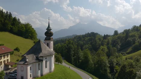 Aerial-View-of-Maria-Gern-Church,-Mount-Watzmann-in-Background