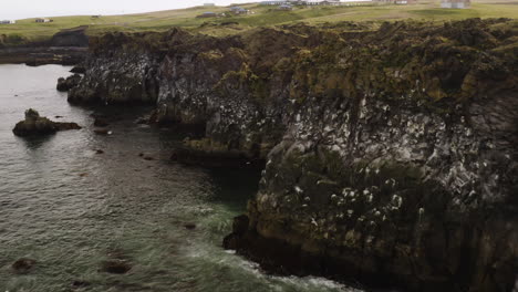 Rugged-Cliffs-on-Beautiful-Iceland-Coastline-on-Snaefellsnes-Peninsula,-Aerial-Establishing-Flight