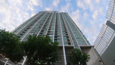 Time-Lapse-of-a-Condominium-Building-Looking-Directly-Upward-with-Sky-and-Clouds