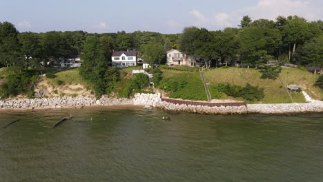 Cost-line-of-Lake-Michigan,-gorgeous-homes-and-vanished-beach