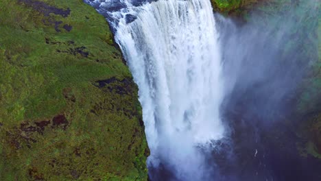 Iceland-Waterfall-Skogafoss-In-Icelandic-Nature-Landscape---aerial-drone-shot