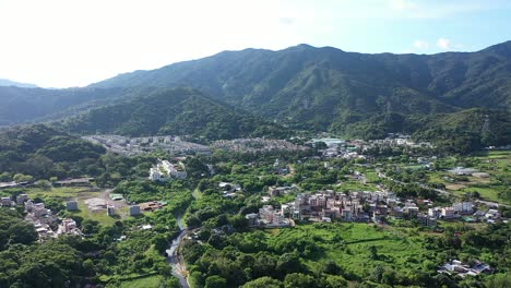 Aerial-View-Of-Affluent-Suburb-With-A-View-Of-Mountain-Range-In-The-Countryside-Of-Hong-Kong