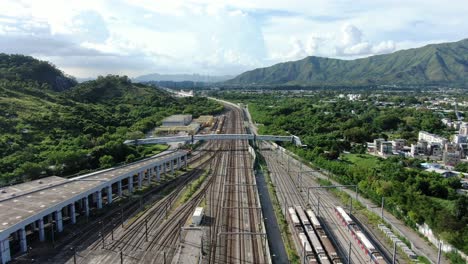 Hong-Kong-MTR-Railroad-in-the-city-outskirts,-Aerial-view