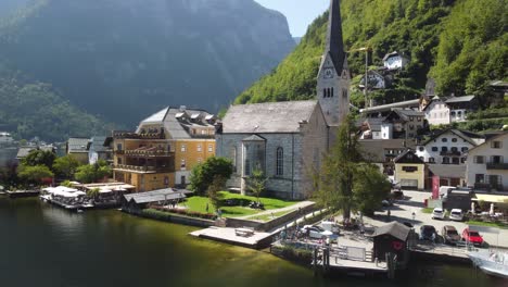 Amazing-aerial-view-of-Hallstatt-skyline-in-summer-season,-drone-view-from-the-lake---Austria