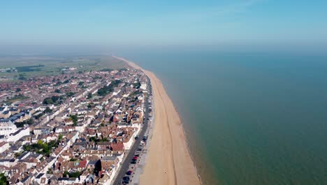 Aerial-Along-Deal-Beach-Seafront-In-Kent-With-Town-In-View