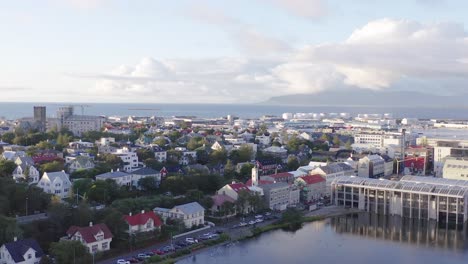Urban-scene-of-Midborg-district-in-Reykjavik-during-sunset,-City-Hall-Reykjavíkur