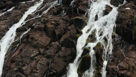 Flying-over-a-waterfall-in-Bié-,-Angola-on-the-African-continent-7