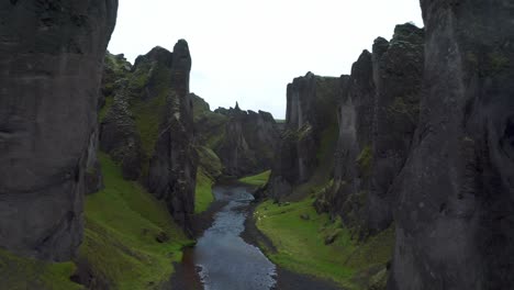 Fjaðrárgljúfur-Canyon-On-The-South-Coast-Of-Iceland---aerial-drone-shot