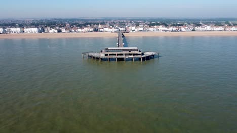 Deal-Pier-With-Beach-And-Town-In-Background