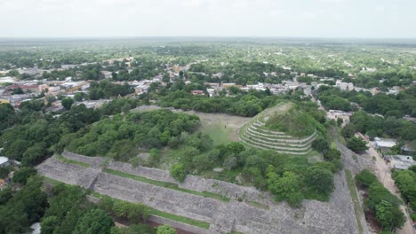 Aerial-shot-of-the-ruins-of-the-pyramid-in-izamal-yucatan-Kinich-Kakm?