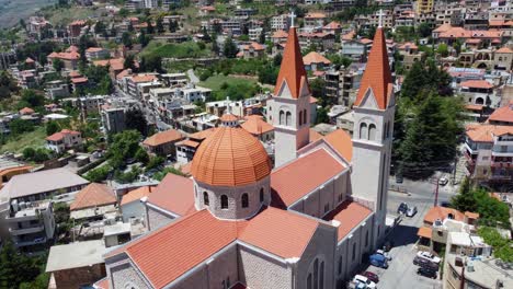 Aerial-View-Of-Saint-Saba-Cathedral,-A-Maronite-Church-In-Bsharri-Town-Near-Kadisha-Valley-In-Lebanon