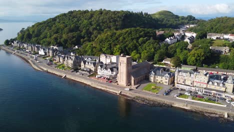 St-Columba's-Cathedral,-Oban-Harbour,-Seaside-Town-on-West-Coast-of-Scotland,-Aerial-Drone-4K-HD-Footage-Rotating