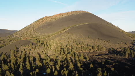 Drone-flight-showing-majestic-dry-barren,-Cinder-cone-volcanic-lava-mountain-on-earth