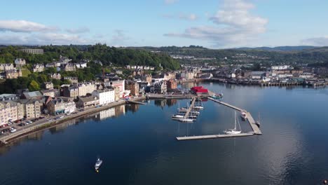 Oban-Harbour-Lake,-Seaside-Town-on-West-Coast-of-Scotland,-Aerial-Drone-4K-HD-Footage-Rising-Up