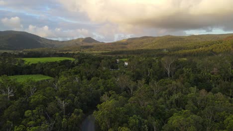 Bird's-Eye-View-Of-Lush-Forest,-Rural-Fields-And-Mountains---Conway-Forest-Reserve-In-QLD,-Australia