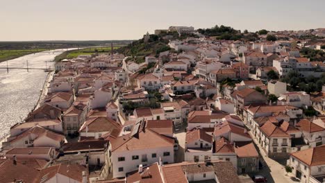 Fly-over-Alcacer-do-Sal-picturesque-white-townhouses-with-red-roofs