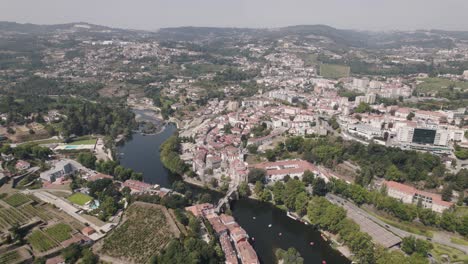 Spectacular-aerial-view-of-parish-town-in-Amarante-above-Sao-Goncalo-monastery-and-tamega-river