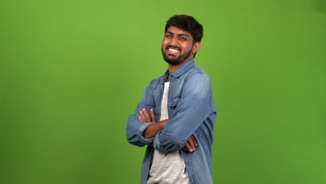 Rejoicing-Asian-male-showing-off-his-happiness-and-rejoicing-over-his-success-in-a-green-screen-shoot