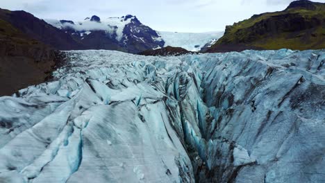 Aerial-View-Of-Svinafellsjokull-Glacier-With-Deep-Crevasses-In-Iceland