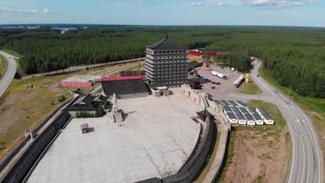 Dragon-Gate-Chinese-Cultural-Center-in-Sweden-Along-European-Route-Highway,-Orbital-Drone-Shot