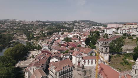 Majestic-rooftops-of-Amarante-town-in-Portugal,-aerial-orbit-view