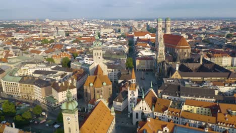Drone-Flying-Away-from-Munich's-Famous-Marienplatz-Plaza
