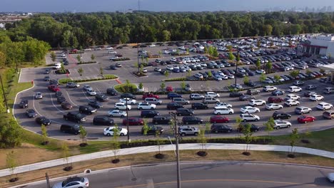 Aerial-of-cars-lined-up-at-gas-station-during-fuel-shortage-while-people-pump-gasoline