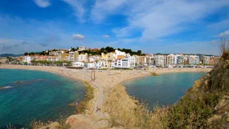 Spectacular-wide-angle-lens-Time-Lapse-of-Blanes-on-the-Costa-Brava-of-Gerona-Barcelona-Spain-close-up-of-the-beach-and-buildings-in-the-background