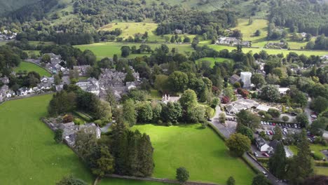 Summers-day-Grasmere-Village-Cumbria-England-Aerial-point-of-view-footage
