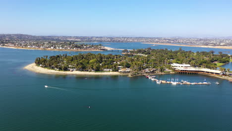 Aerial-View-Of-Paradise-Point-With-Boats-In-Blue-Water-At-Mission-Bay,-San-Diego---drone-shot