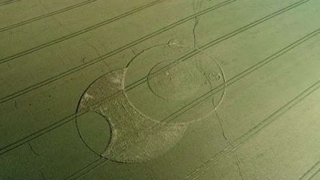 Wiltshire-Wootton-rivers-strange-crop-circle-pattern-in-countryside-farmland-field-aerial-drone-view-rising-birdseye
