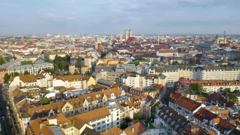Drone-Flying-Above-Munich-Neighborhood-on-Picturesque-Summer-Day