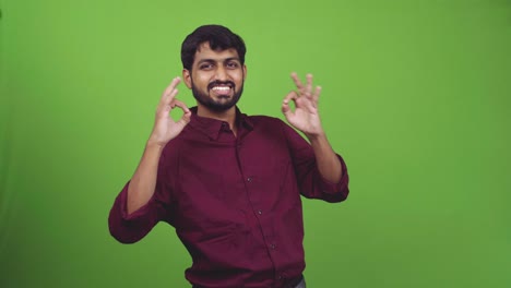 Attractive-person-showing-global-everything-in-perfect-gesture,-isolated-on-green-screen