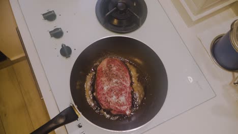 Frying-A4-Wagyu-Beef-Steak-On-Sizzling-Oil-In-A-Frying-Pan