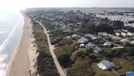 Hemsby-seaside-village-Norfolk-England-houses-in-danger-from-coastal-erosion-drone-footage-4K
