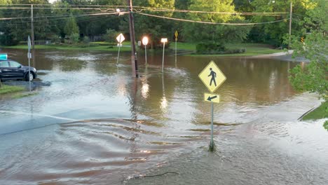 Pedestrian-crossing-crosswalk-under-flood-water