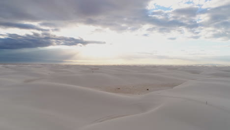 4k-aerial-of-beautiful-desolate-endless-white-sand-dunes-at-sunrise