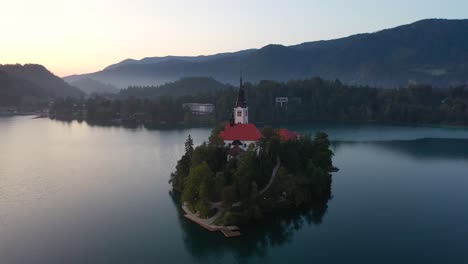 Lake-Bled,-Slovenia---aerial-footage-around-Pilgrimage-Church-of-the-Assumption-of-Maria-above-Lake-Bled