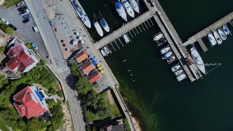 Top-Down-View-Of-Harbor-In-Norra-Hamnen,-Lysekil,-Bohuslän,-Sweden---drone-shot