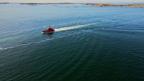Red-Swedish-Pilot-Boat-Cruising-In-Skagerrak-Strait-Near-Lysekil-In-Sweden